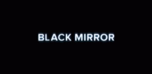 black mirror in the dark with the word