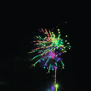 a colorful fireworks bursting in the night sky