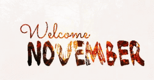 a close up of the words welcome november with a blue ink effect