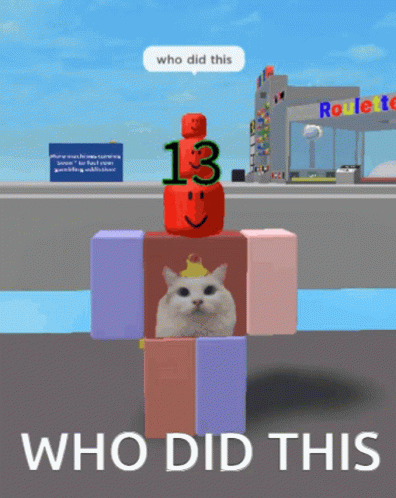 an animated cat with a fake blue head is on a blocks