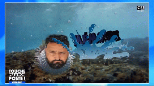 a man with blue eyes and a beard in the water