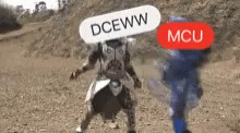 two young people running on a hill with a sign saying dceww and mcu