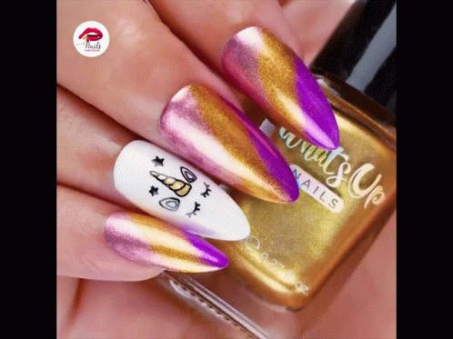 a manicure is being worn to display the designs on nails