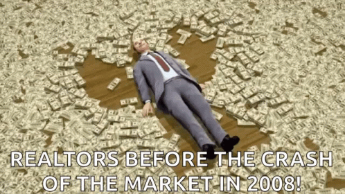 a business person lies down on the ground covered in letters