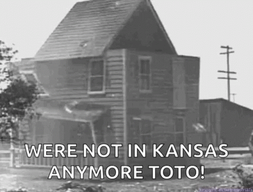 a house with the words'we are not in kansas anymore to'written below it