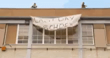 the banner is in front of an office building