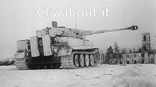 a black and white picture with a po of two tanks