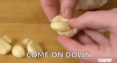a person is making fake eggs with a glove