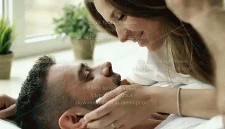 a woman is giving a man a facial peel