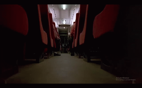 empty bus seats in the dark of night