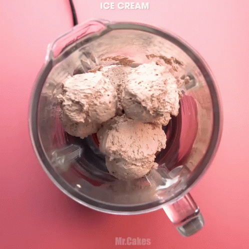 ice cream in a blender on a purple background