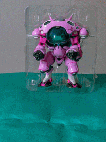 an image of a figurine in a clear box