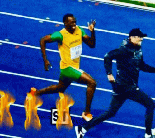 two male athletes running on a track
