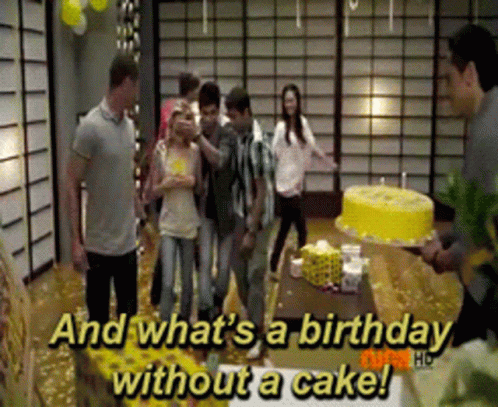 several people standing around a cake and confectioning