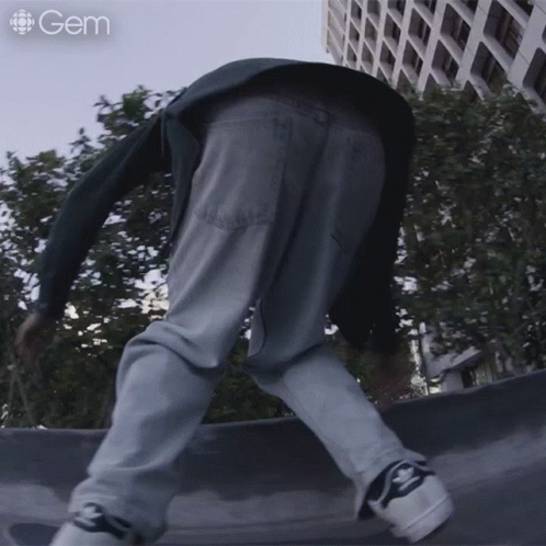 a skateboarder in the middle of a jump