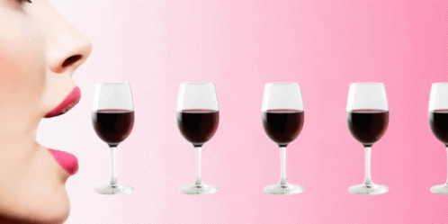 an image of a woman with wine glasses