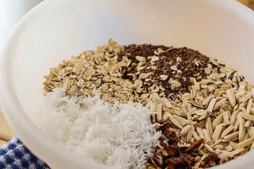 an empty bowl with shredded blue and white rice inside