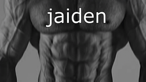a picture of the back of a man's chest with an words on it
