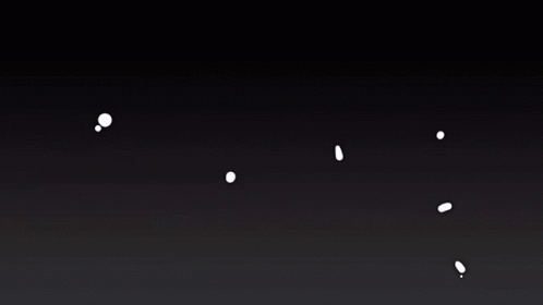 the view from a dark, dark area in the sky shows all the small objects that are above a hill