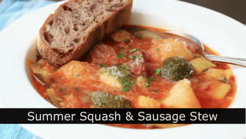 the text summer squash and sausage stew in a bowl