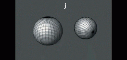 an aerial view of three identical ball objects with the caption j
