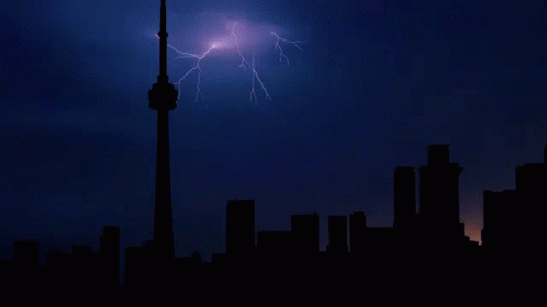 a lightning strike over the city at night