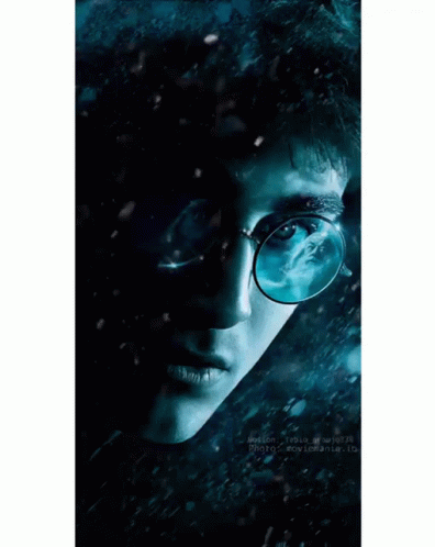 an image of harry potter looking out through the rain