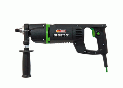 a black and green power tool sitting on top of a white table