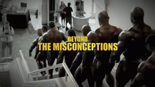 a group of bodybuilding men walking up the stairs