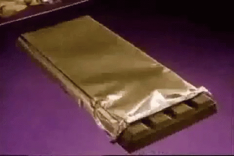 a silver foil bag on top of a purple table