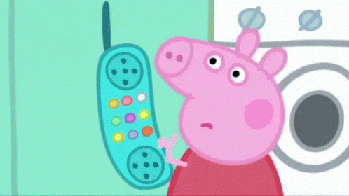 an animated pep pig next to a phone and washer