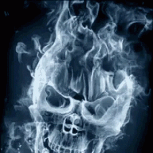 a burning skull appears to have a strange look on his face