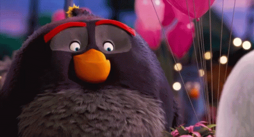 the angry birds float near balloons in a scene