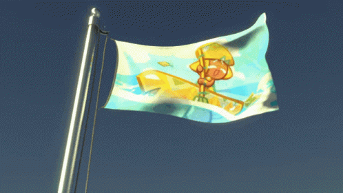 a flag with a cartoon character flying over a hill