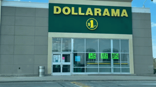a large dollargramma store with multiple stores across the street from it