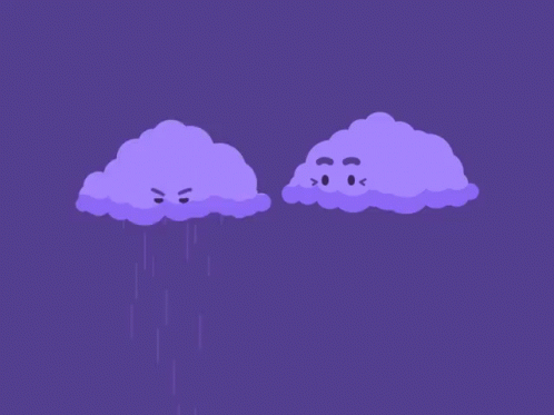 two pink cloud shaped objects with eyes on them