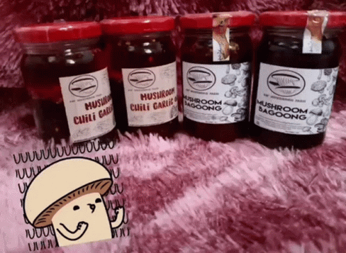 five jars with different labels in a row
