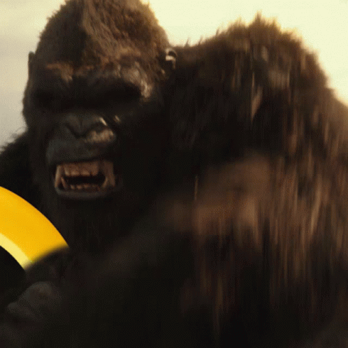 an angry gorilla is in motion with a blue disk