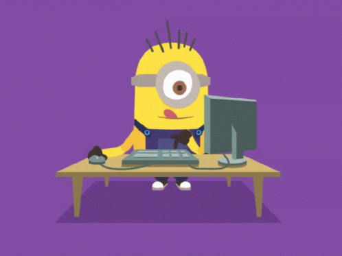 cartoon character using computer monitor on table
