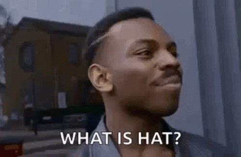 a man with ear buds and a video that says what is hat?