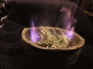 a bowl is shown with flames in it