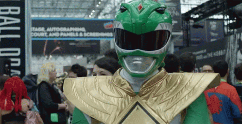 an image of a woman wearing a green suit and helmet