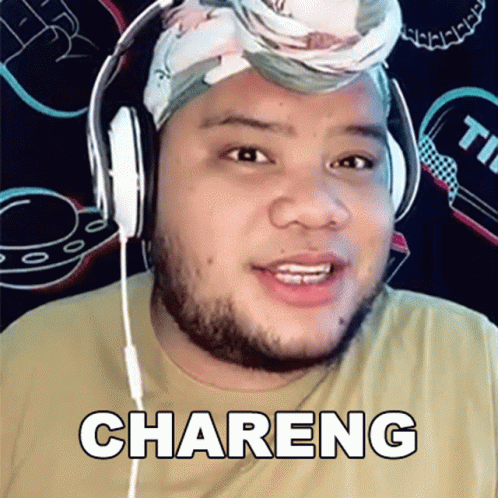 a man wearing headphones is shown with the word charing