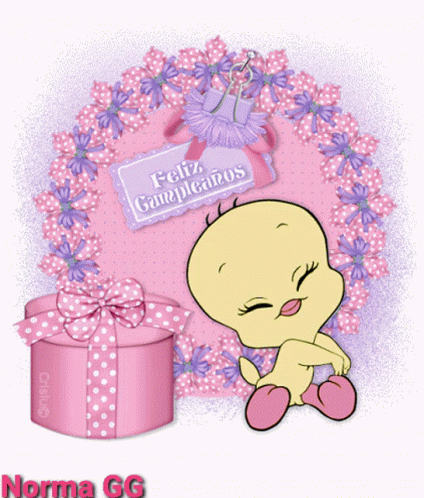 a baby blue bird sits with a purple present on its lap and next to a pink round wreath