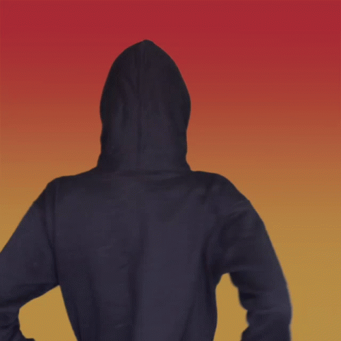 a person wearing a hoodie standing in the air