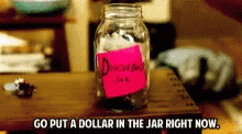 there is an image of a jar filled with money
