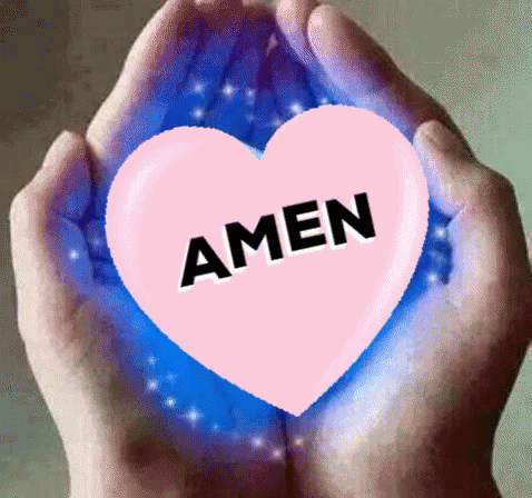 two hands hold a paper heart with the word amen projected in it