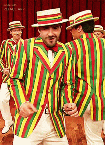 some guys wearing different colored striped suit and tie