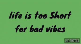 the words life is too short for bad vibes on a green background