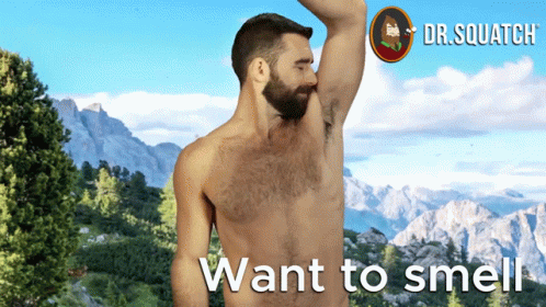 a male model with a beard and  is shown, with a mountain in the background